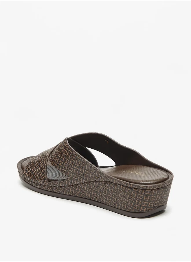 فلورا بيلا من شو إكسبرس Logo Print Cross Strap Slip On Sandals with Wedge Heels