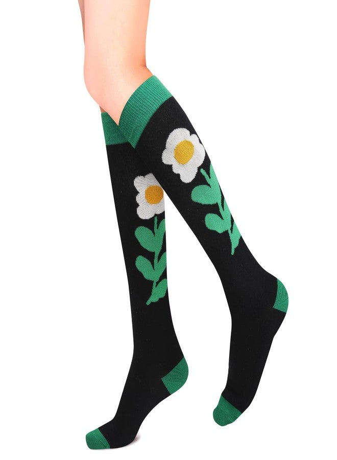 Benefeet Sox جوارب طويلة سوداء لطيفة للنساء والفتيات، جوارب طويلة خضراء مزينة بنقوش زهور عباد الشمس، جوارب قطنية طويلة مريحة، جوارب رياضية ملونة ومرحة بنقوش مميزة، جوارب أنبوبية للبيسبول، عباد الشمس، أخضر وأسود - Image 1