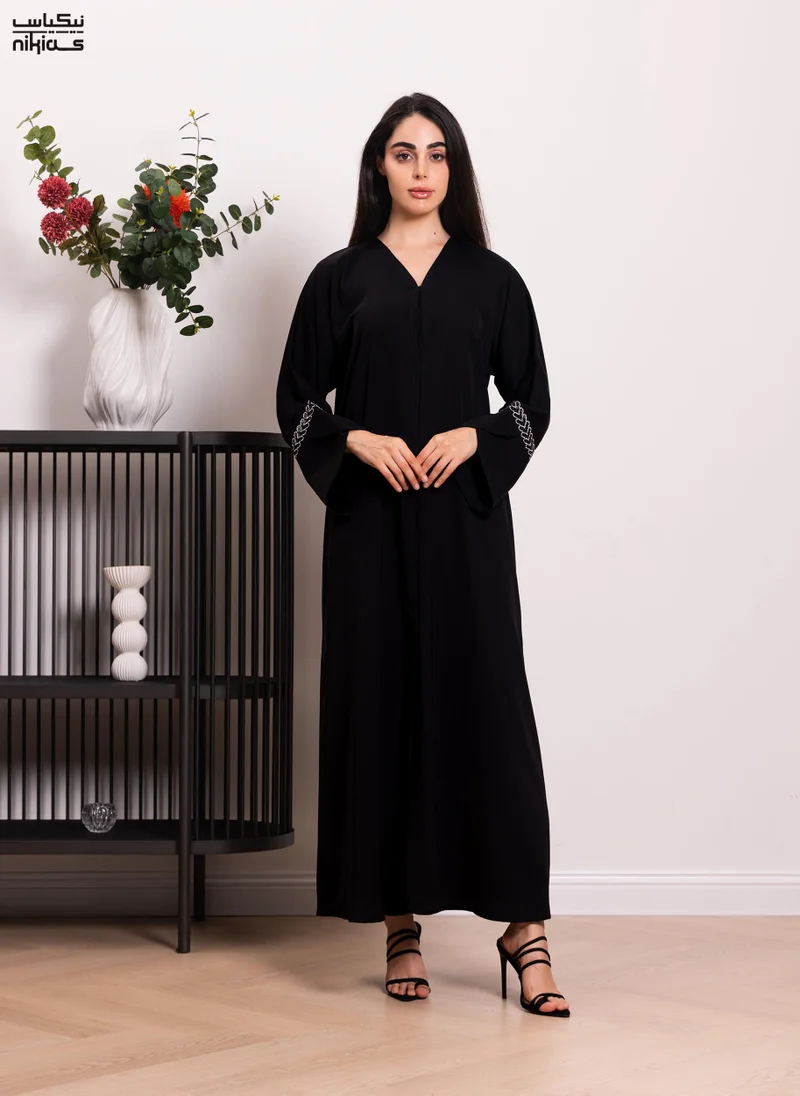 نيكياس عباية نيكاس نيدا بأزرار ودانتيل مرصع