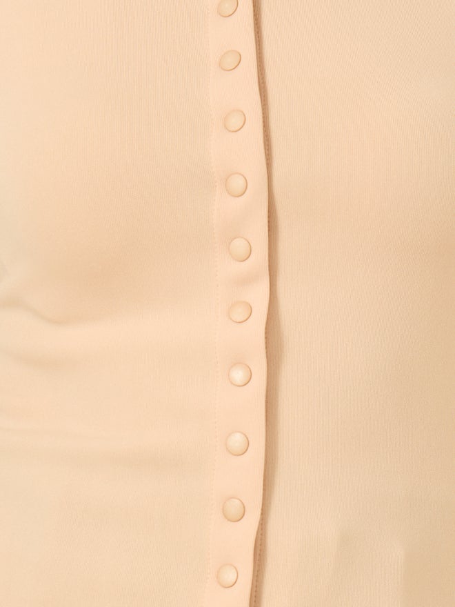 ستايلي بلوزة بدون أكمام محبوكة بياقة دائرية وتفاصيل أزرار - Image 4