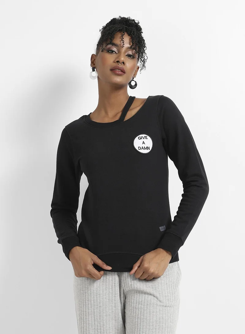 Campus Sutra Women's Black Give A Damn Hoodie With Cut-Out Detail For Casual Wear | Asymetrical Neck  | Long Sleeve | Pull On Closure | Cotton Sweatshirt Crafted With Comfort Fit For Everyday Wear