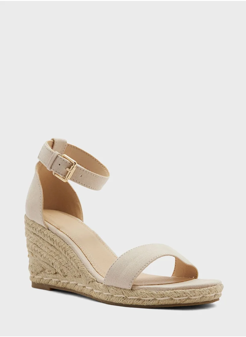 ترافل من نمشي Womens Mid Heel Wedge Sandal