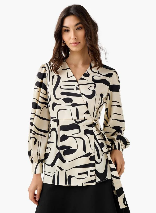 ايكونيك بلوزة لف بقصة عادية بطبعة تجريدية