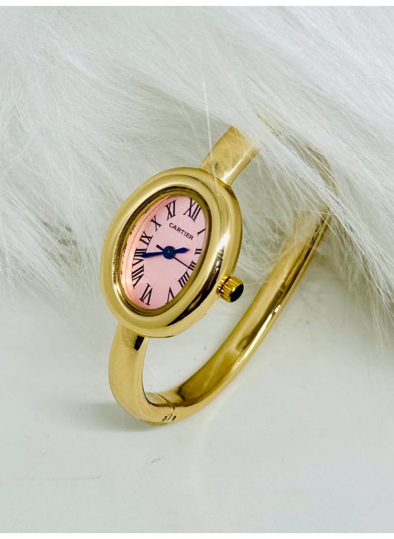 Cartier Women’s Oval Bracelet Watch – Gold Tone with Pink Dial & Roman Numerals