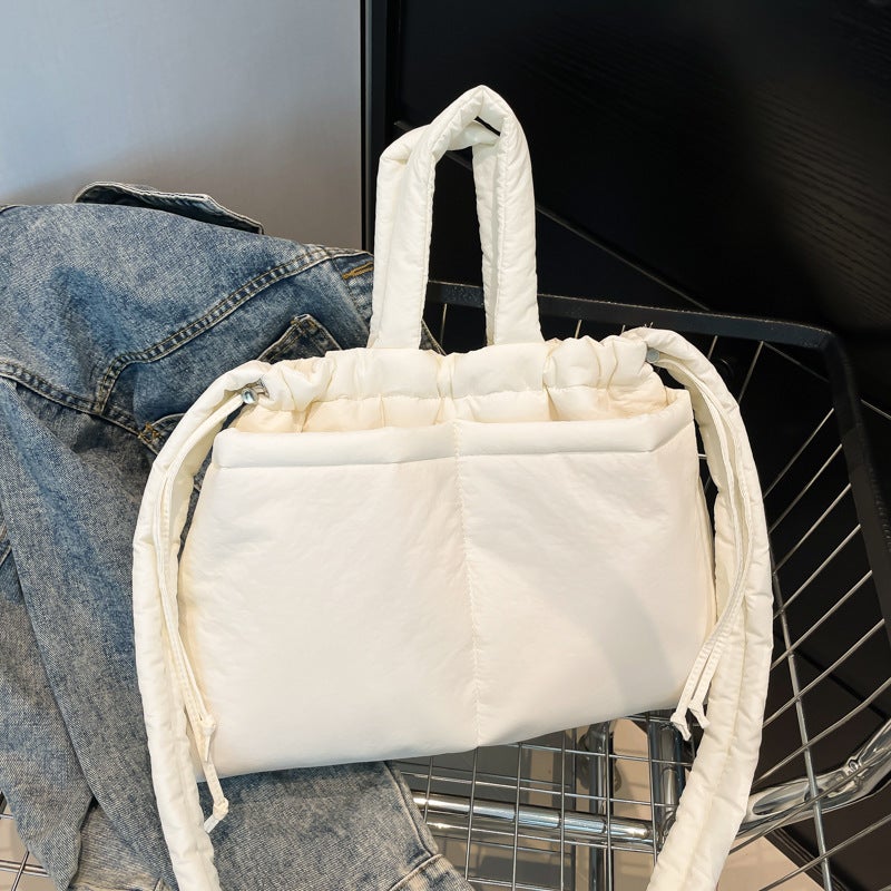 Nylon Cloth Drawstring Niche Tote Bag Women'S Arrival Fashionable Large Capacity Lightweight Soft Quilted Shoulder Bag - Image 1