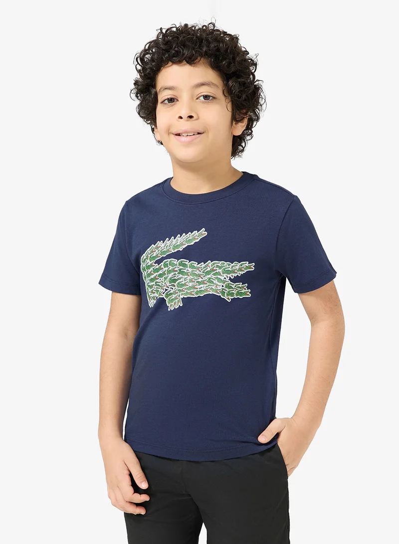 لاكوست تيشيرت بياقة دائرية وشعار للأطفال