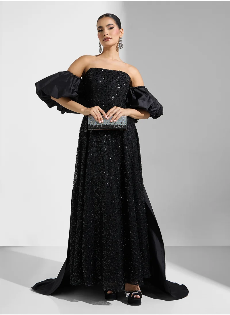 نمشي x Embellished Off Shoulder Dress With Bow Trail
