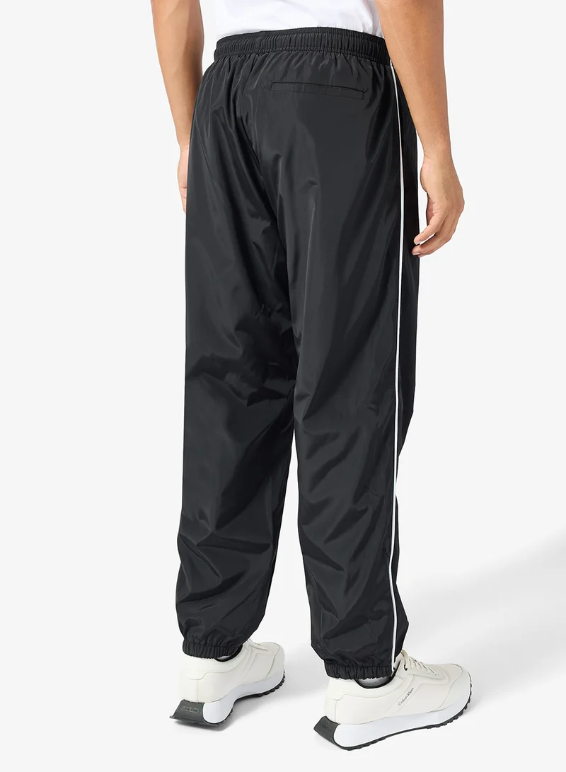 Calvin Klein Jeans  Drawstring Straight Joggers for Men | Best Price UAE