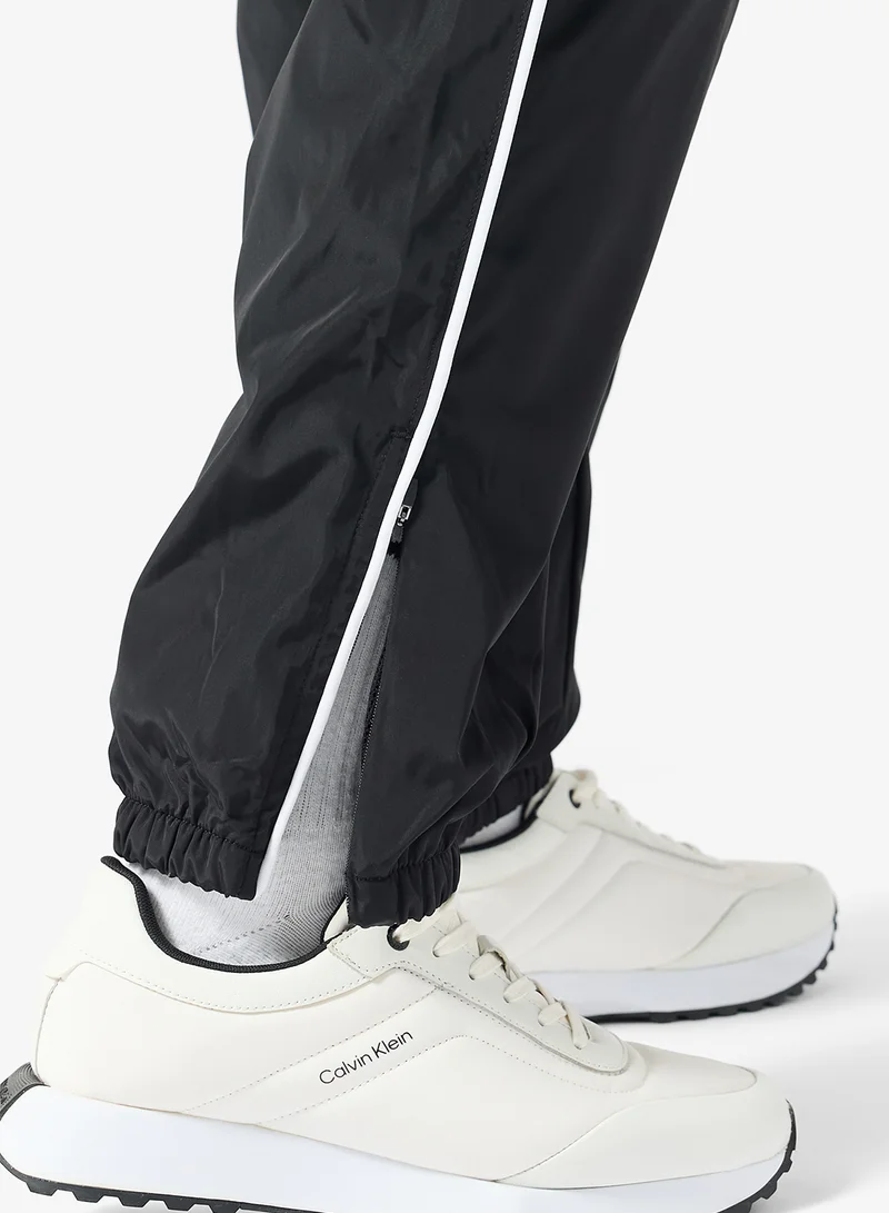 Calvin Klein Jeans  Drawstring Straight Joggers for Men | Best Price UAE