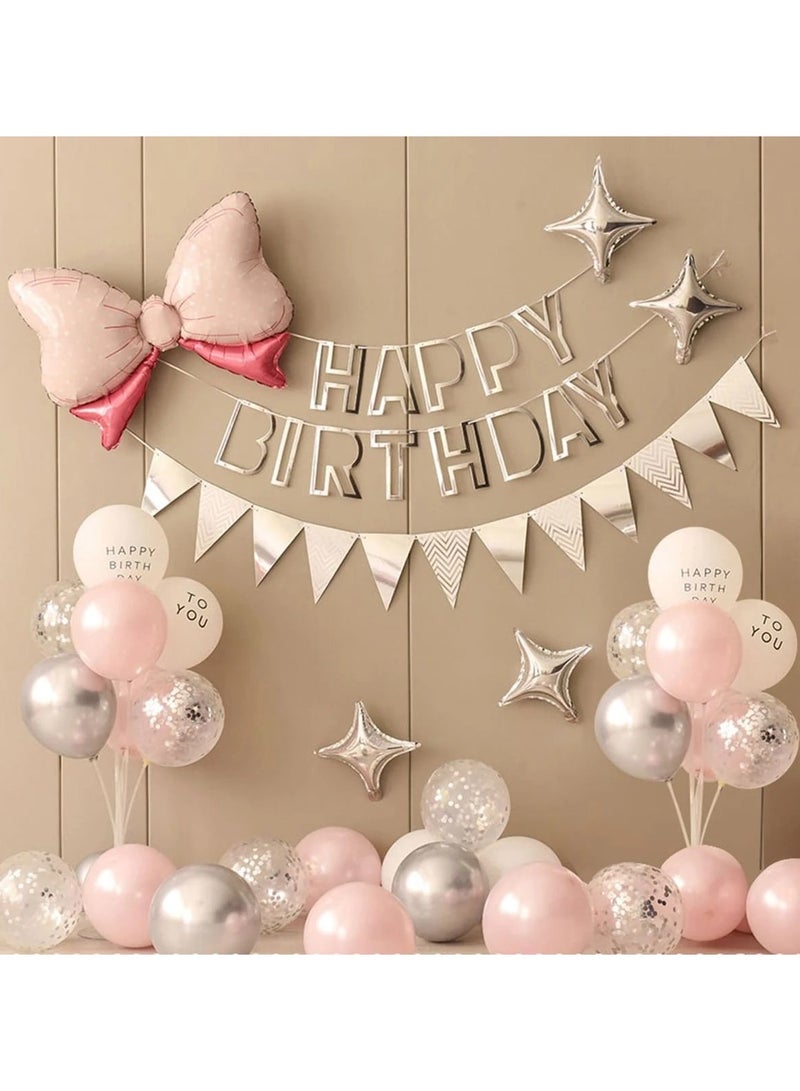 A set of 36 birthday decorations that includes a bow-shaped foil balloon, latex balloons in pink and white, a “Happy Birthday” banner, and a silver-colored pennant banner. - Image 1