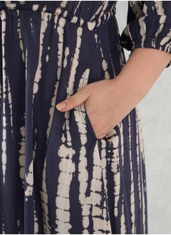 Femmella Plus Size Tie and Dye Print V Neck A-Line Midi Dress by Styli  - Image 5