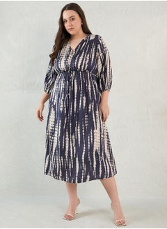 Femmella Plus Size Tie and Dye Print V Neck A-Line Midi Dress by Styli  - Image 1
