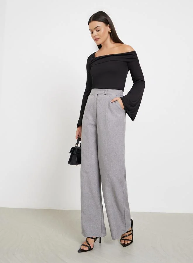 ستايلي بلوزة محبوكة بياقة غير متماثلة الطول