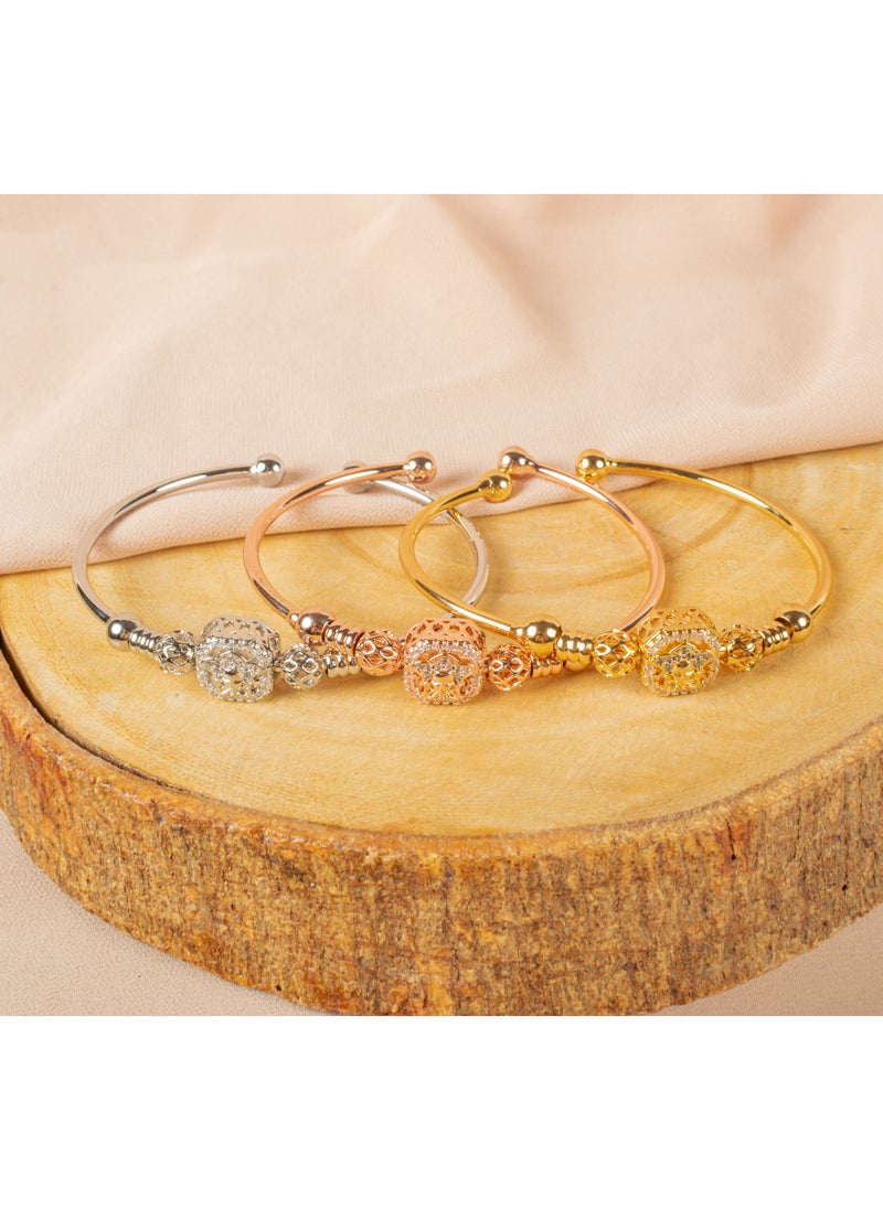 The Black Pearl Accessories - Triple Chinese Gold Free Size Zirconic Medousa Bracelet (Gold, Silver & Rose Gold) - Image 1