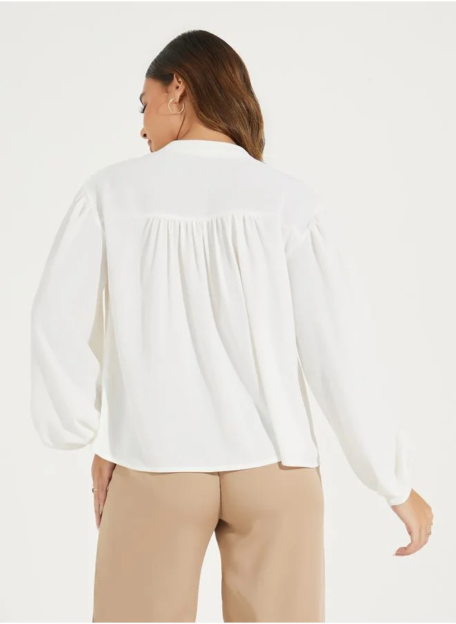 Styli Embroidery Detail Tie-Up Neck Blouse