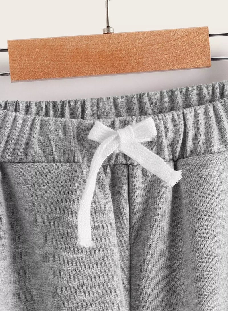 بنطلون رياضي برسومات وأحرف للأولاد - Image 4