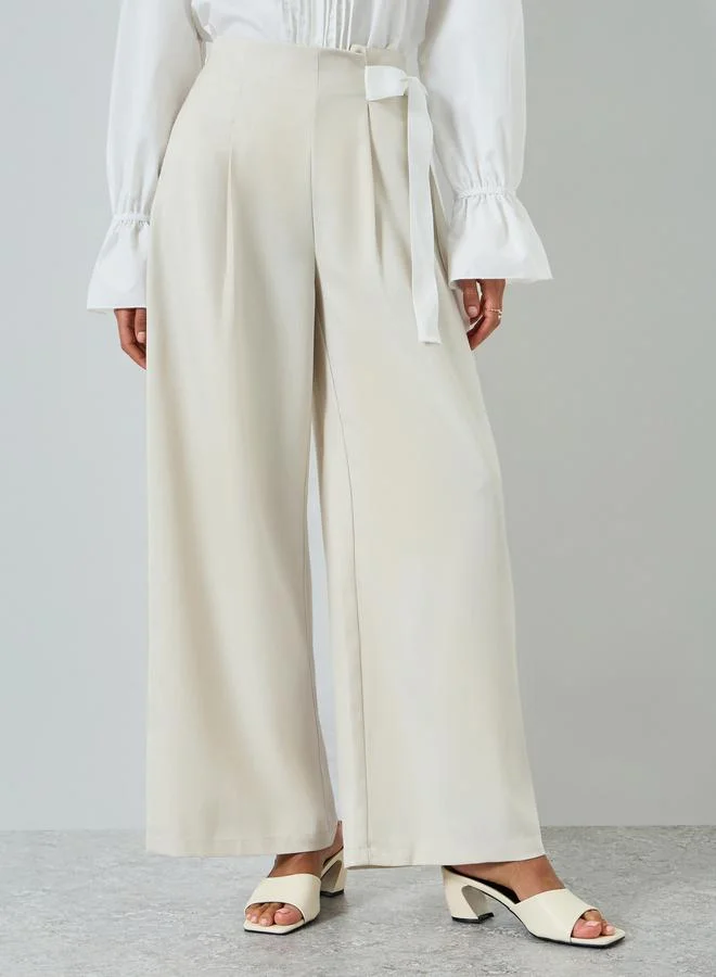 تايك تو بنطال بأرجل واسعة بيج