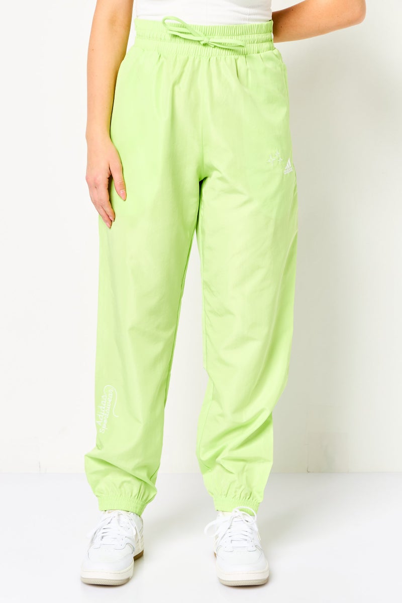 Adidas سروال تدريب فضفاض للنساء، ليموني - Image 1