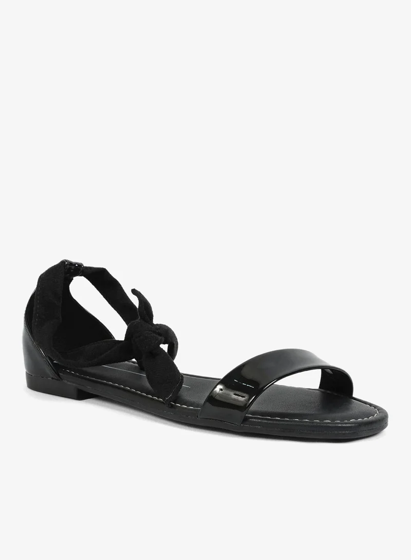 موليكا صنادل مسطحة بحزام للكاحل