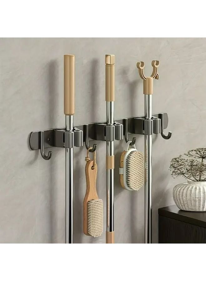 حامل مكنسة رمادي مثبت على الحائط مع 4 خطافات من الفولاذ المقاوم للصدأ لتنظيم الغسيل والمرآب - Image 1