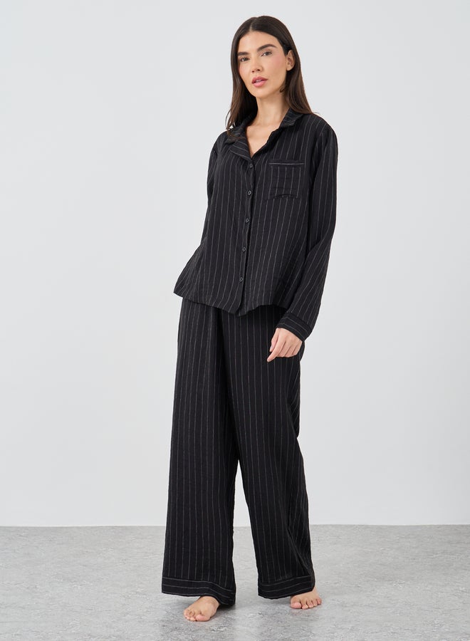 A striped pajama set and shirt with buttons in Sty...