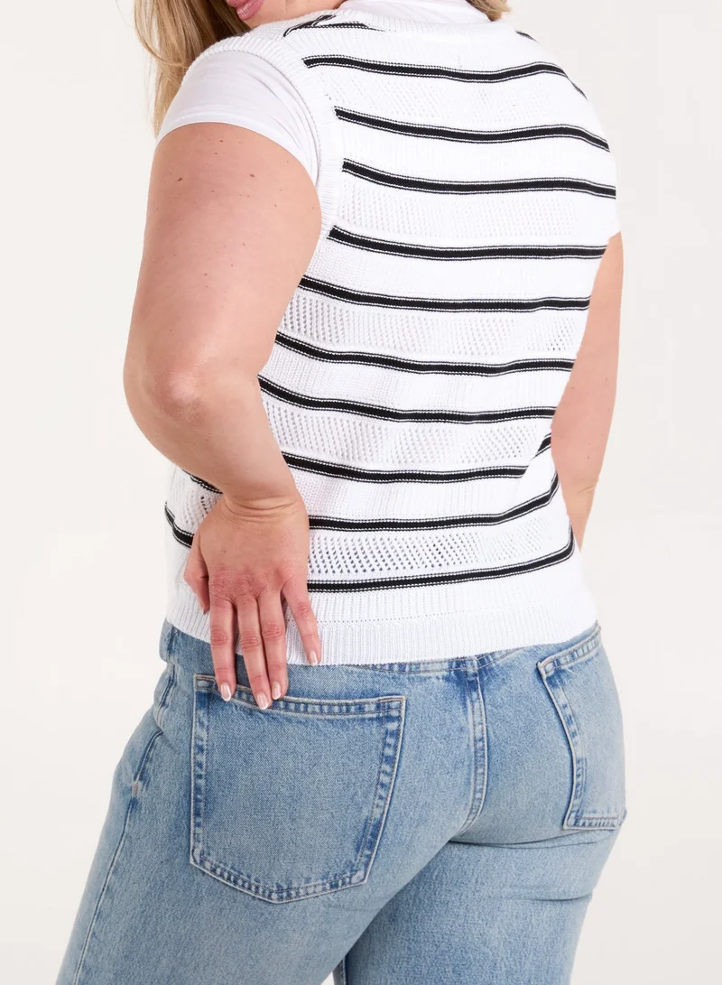 بلو فانيلا سترة محبوكة بدون أكمام مخططة