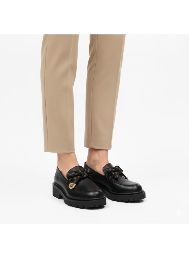 Luxurious women's loafer with elegant lace-up detailing and sophisticated metal embellishment - available in various colors and sizes - Image 1