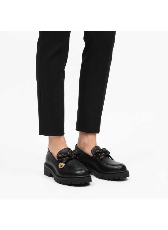 Luxurious women's loafer with elegant lace-up detailing and sophisticated metal embellishment - available in various colors and sizes - Image 2