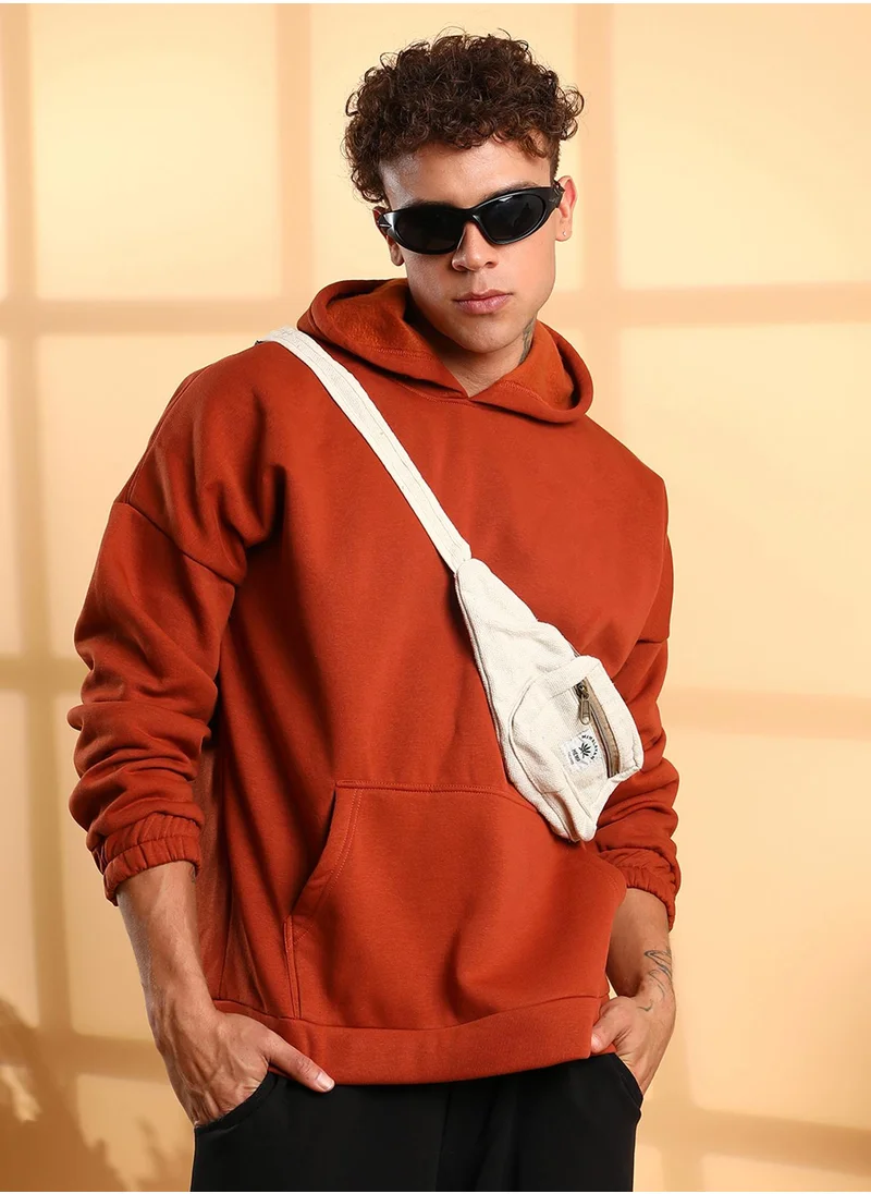 Campus Sutra Men's Burnt Orange Oversized Pullover Sweatshirt With Kangaroo Pocket