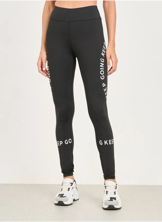 ستايلي Slogan Print High Rise Broad Waist Full Length Active Leggings