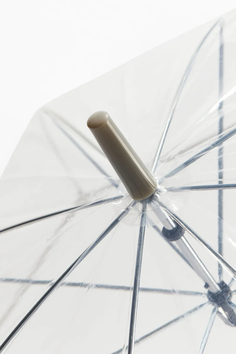 اتش اند ام شمسية شفافة