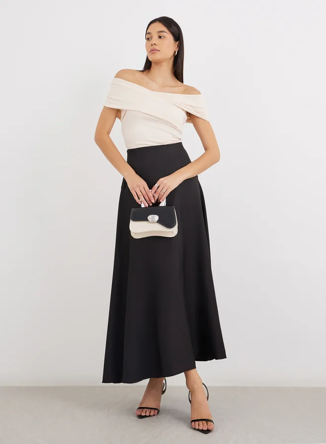 Styli Styli Solid A-Line Maxi Skirt with Button Detail