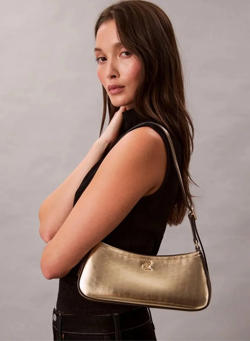 Calvin Klein GOLD METALLIC Monogram Metallic Small Shoulder Bag for Women | Best Price UAE