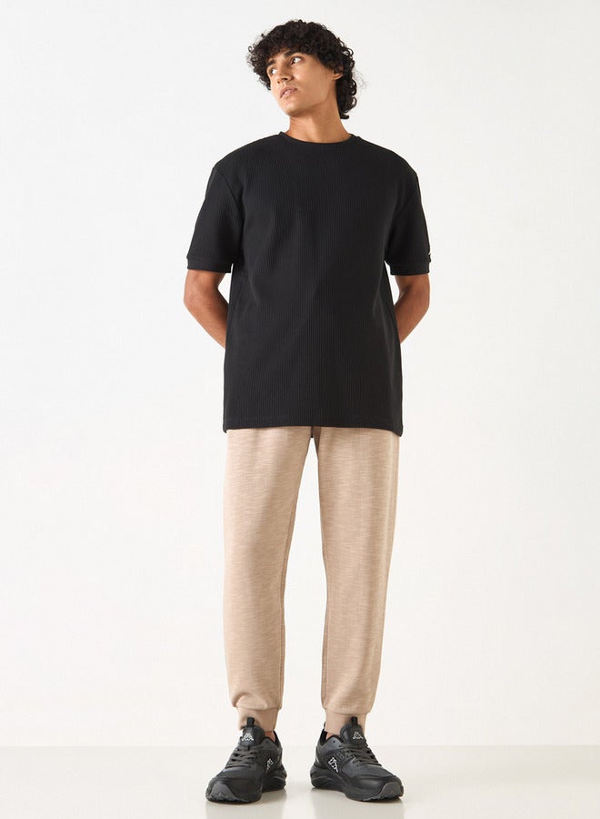 كابا بنطلون رياضي بتطريز شعار ورباط إغلاق وجيوب من كابا - Image 2