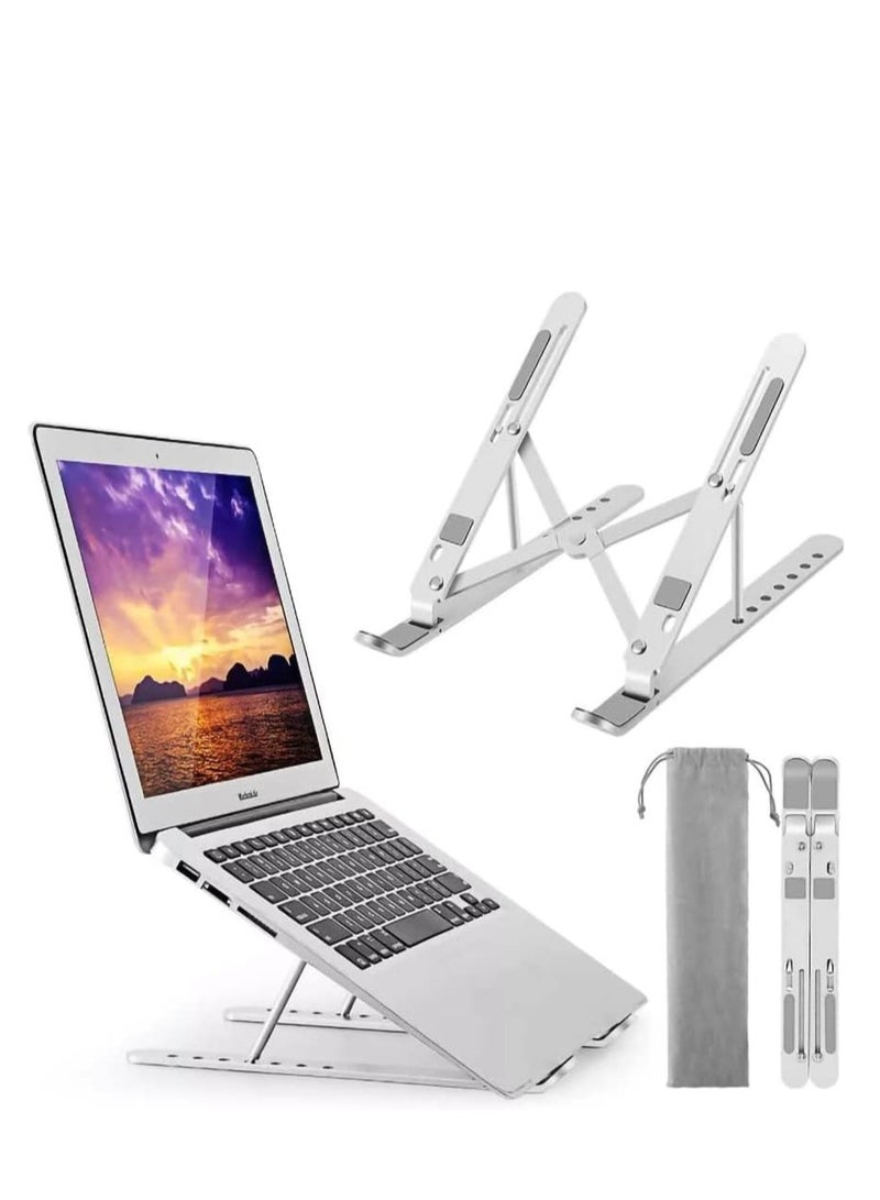 A durable and lightweight laptop stand made of aluminum. It folds and adjusts easily for comfortable use. It stays secure on the desk and is non-slip. - Image 2