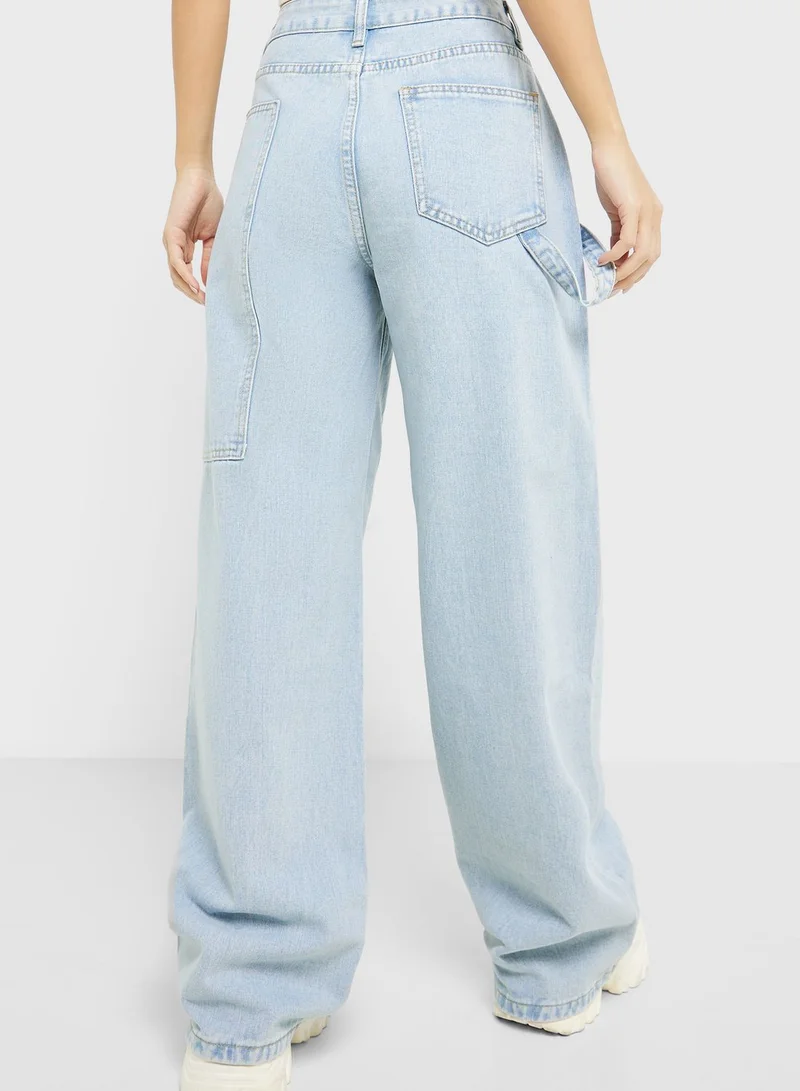 Ginger Strap Pocket Detail Mom Jeans