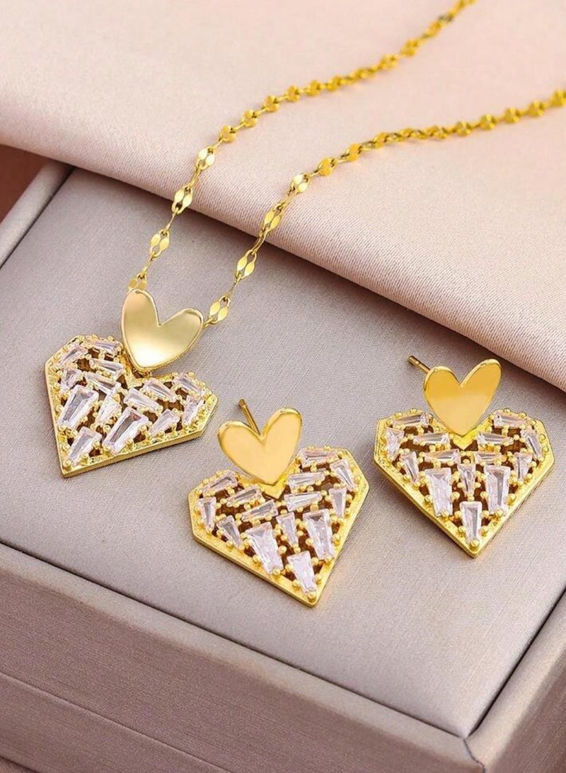 نيو ستايل طقم اكسسوارات نسائي فاخر مكون من سلسال وحلق أذن وخاتم من الاستانلس ستيل مطلي باللون الذهبي - Image 1