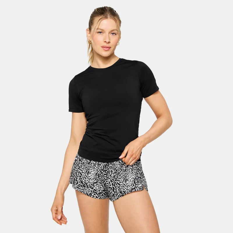 Fabletics توب تدريب فيذر تك+ للنساء