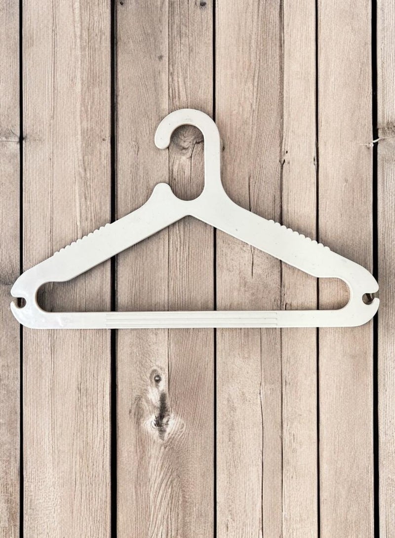 Plastic clothes hanger consisting of white