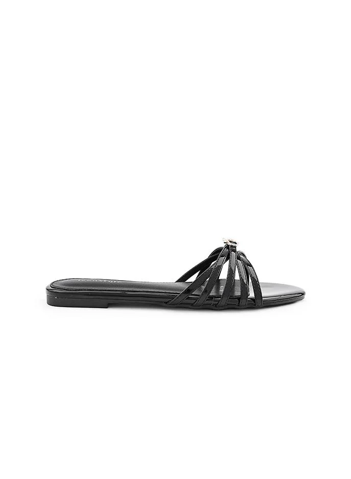 أيقون Comfortable flat sandal with soft upper and flexible sole.