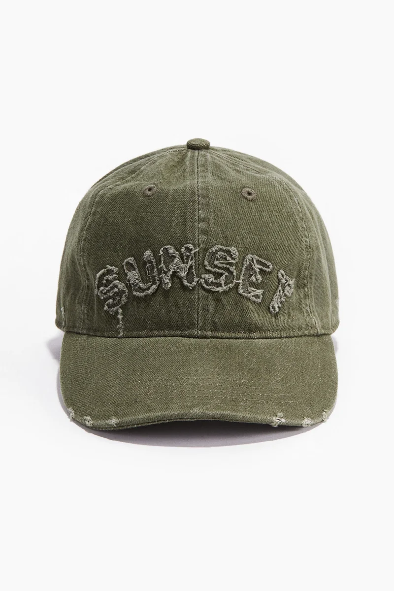 اتش اند ام قبعة من قماش قطني