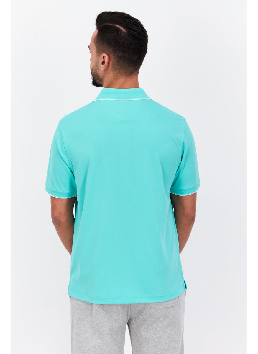 Greg Norman - Men Performance Fit Short Sleeves Outdoor Polo, Pastel Green - Image 1