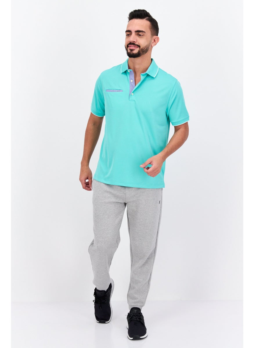 Greg Norman - Men Performance Fit Short Sleeves Outdoor Polo, Pastel Green - Image 1