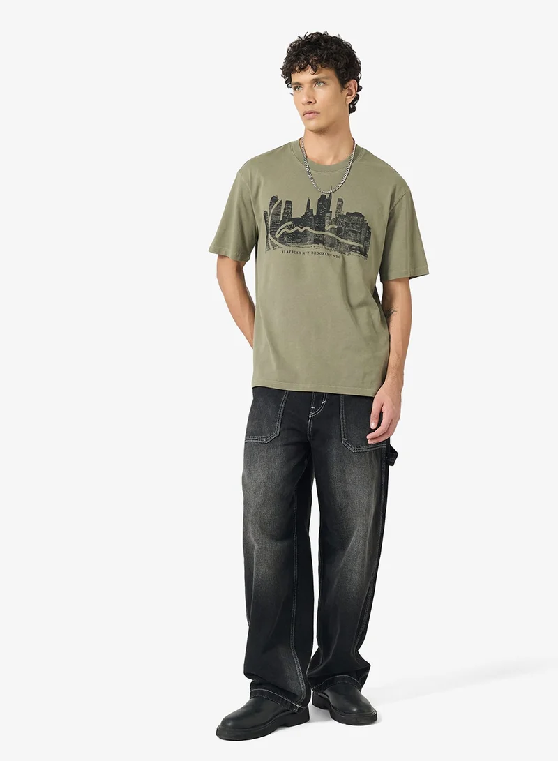 Karl Kani  Signature Skyline Washed Boxy T-Shirt for Men | Best Price UAE
