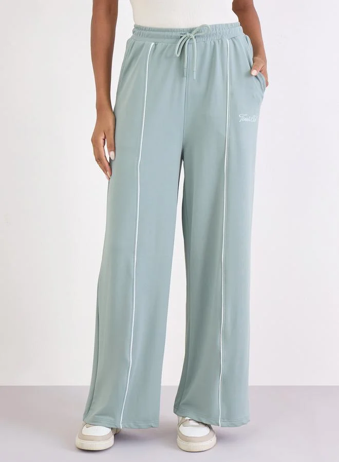 Styli Styli Green Wide Leg Joggers with Piping Detail
