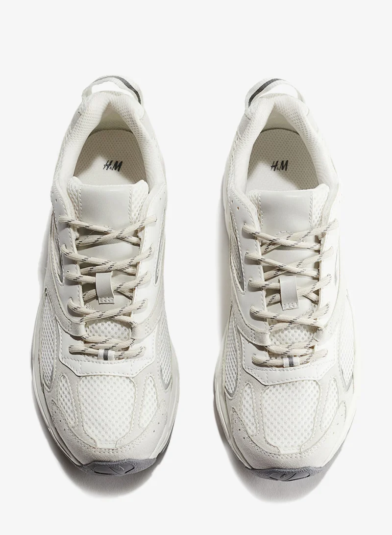 اتش اند ام أحذية رياضية سميكة