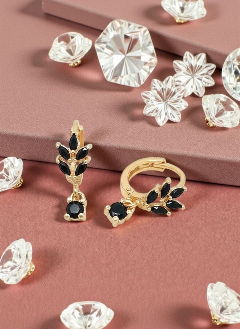 A delicate gold-plated hoop featuring a leaf design studded with black stones, topped with an elegant square-shaped pendant in luxurious black. - Image 4