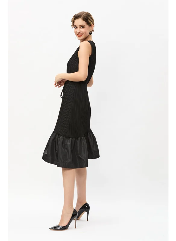 Tenda Pleated dress with ruffled edges