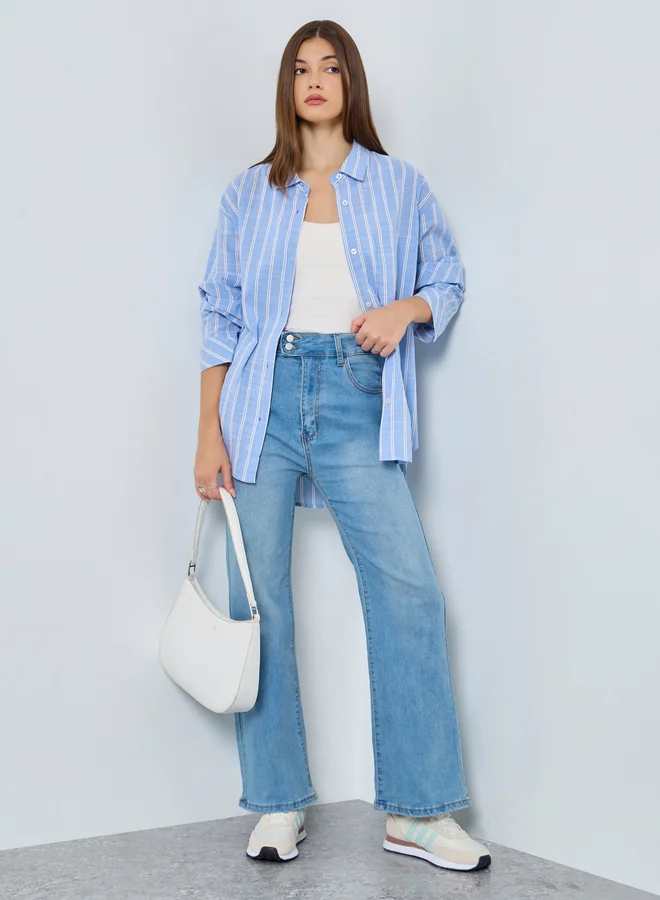 ستايلي جينز واسع الأرجل بخصر عالي وتفاصيل باهتة