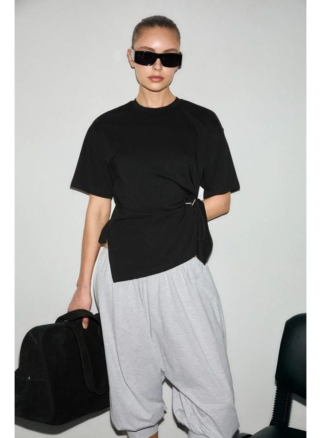 Grimelange CORIAN Women's Organic Cotton Round Collar Blouse with Ruffle and Cord Detail in Regular Black.
